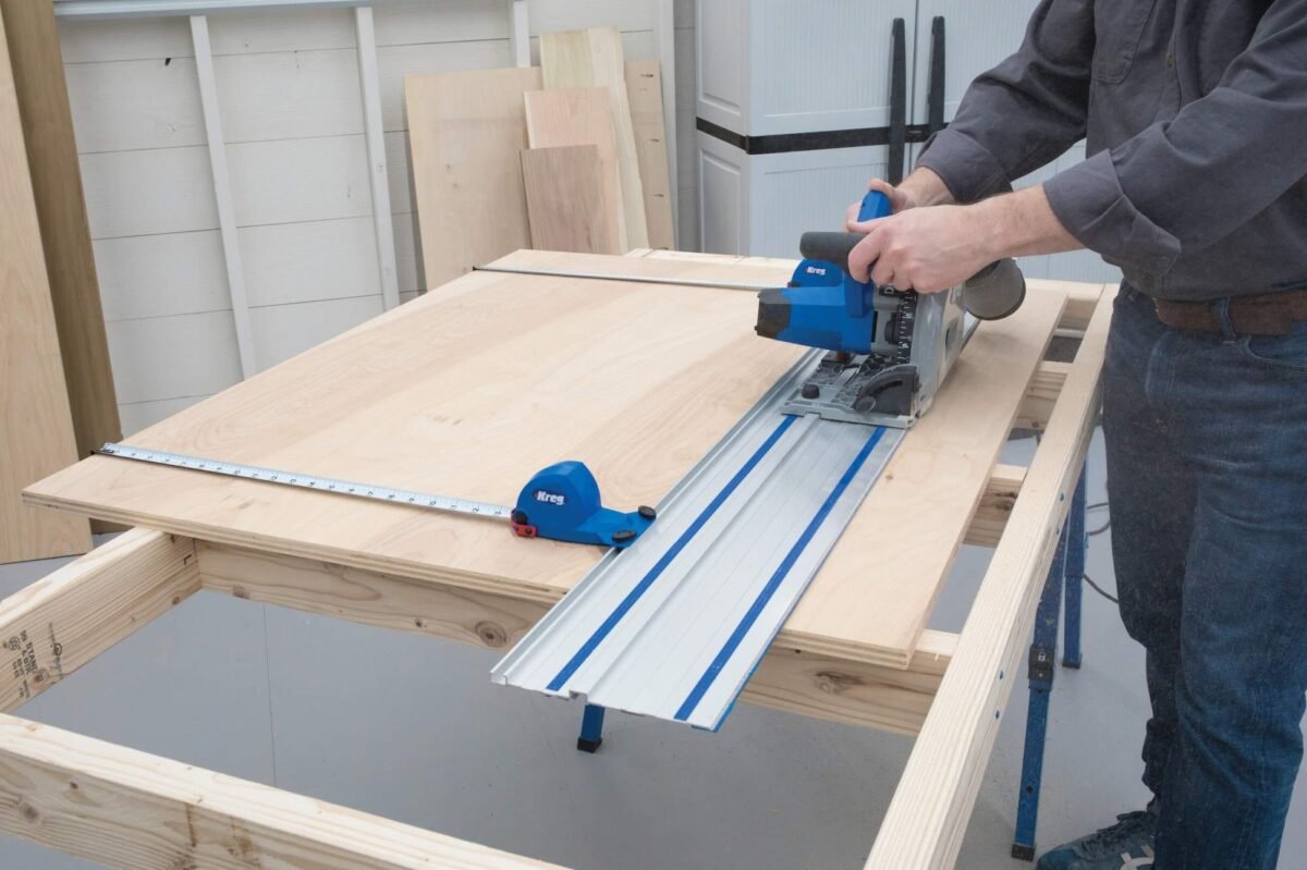 Kreg ACS2000 Adaptive Cutting System hero shot showcasing the integrated track saw, guide rail, and cutting station for precise woodworking.