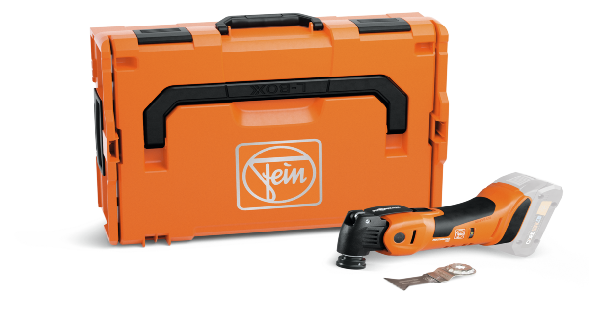 Fein MultiMaster 700 FPM oscillating multi-tool with various Starlock accessories laid out on a clean workshop bench, highlighting its premium design and versatility.