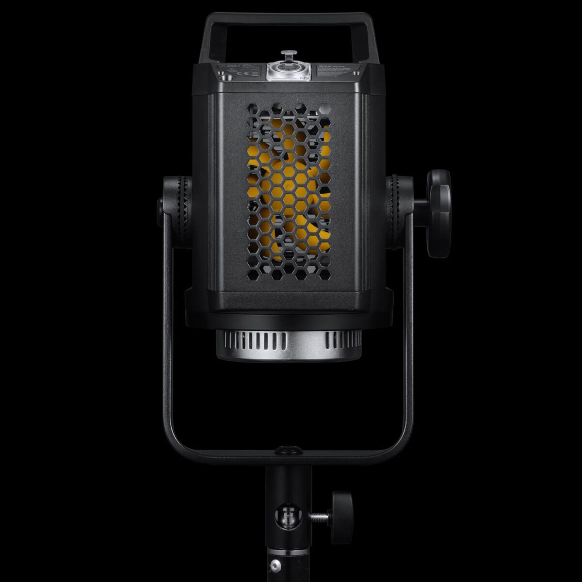 Godox VL150II LED Video Light mounted on a light stand with a large softbox, illuminating a subject for a professional video production.
