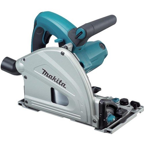 Makita SP6000J1 6-1/2 Plunge Circular Saw Kit in action, precisely cutting a large sheet of plywood along its guide rail, demonstrating its capability for accurate and clean cuts in a workshop setting.