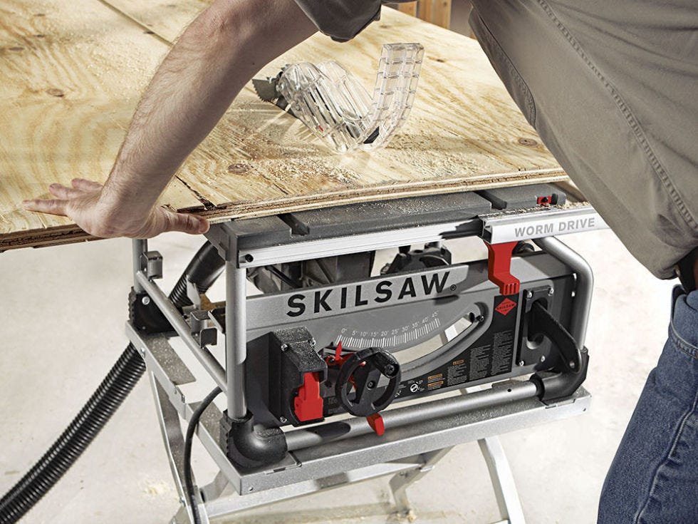 A close-up of a woodworker precisely cutting a sheet of plywood with the SKILSAW SPT70WT-22 Worm Drive Table Saw, showcasing its cutting power and accuracy.